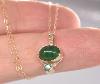       Emerald Gold Necklace