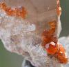 Orange Garnets on Self-Healed Smoky Quartz Phantom